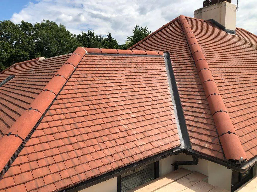 A newly installed roof, the kind of full roof replacement carried out for Derby homes and commercial buildings. A newly installed roof, the kind of full roof replacement carried out for Derby homes and commercial buildings.
